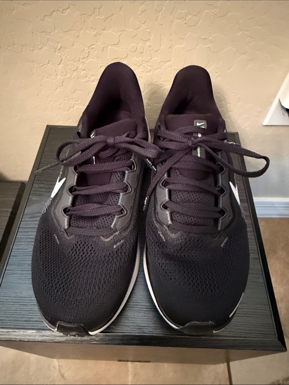 Nike Women’s Black Athletic Running Shoes with White Swoosh